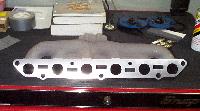 Click to see exhaust manifold after shaving - Large