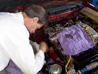Click to see Pat inserting the manifold studs - Large